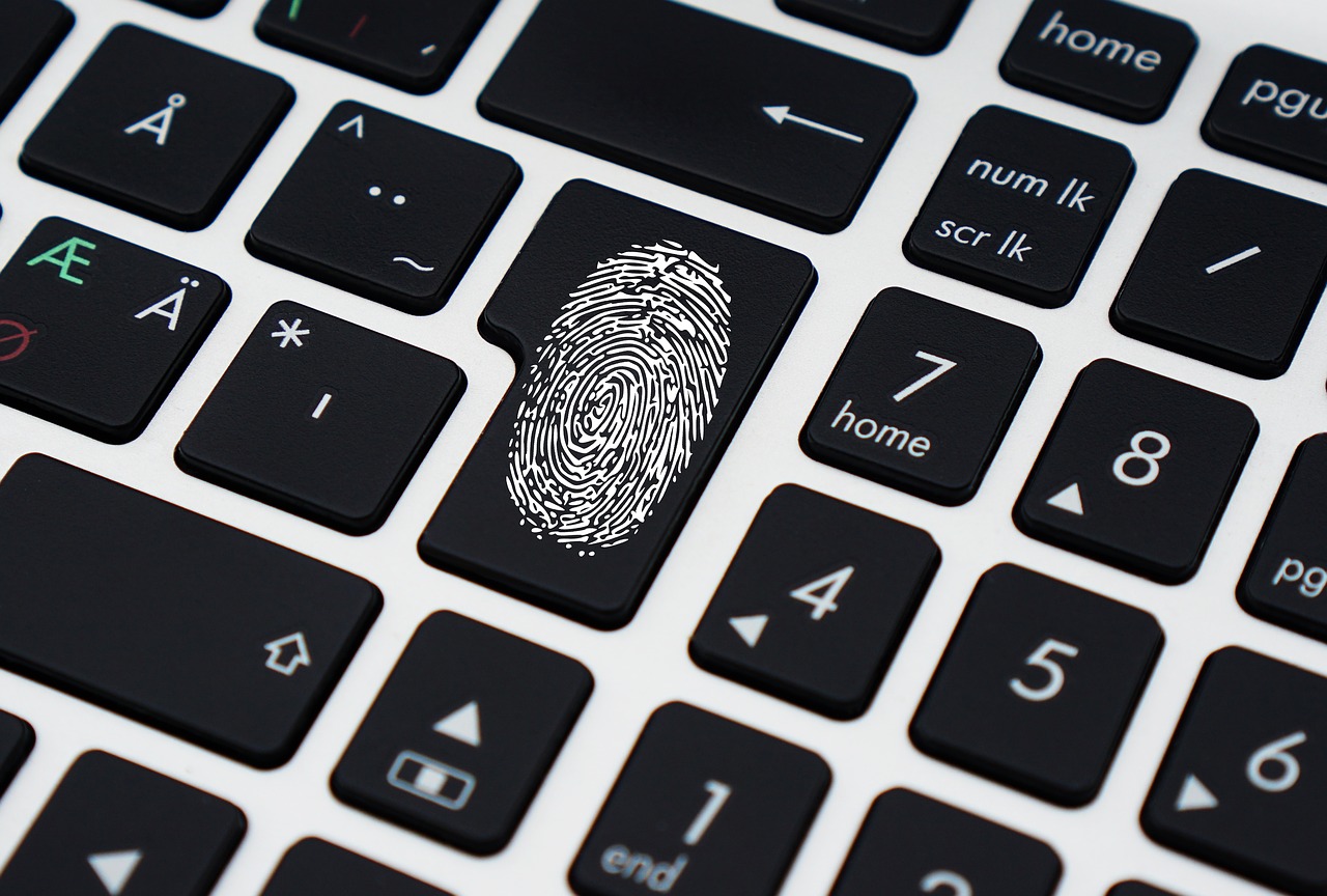 image: laptop keyboard with fingerprint