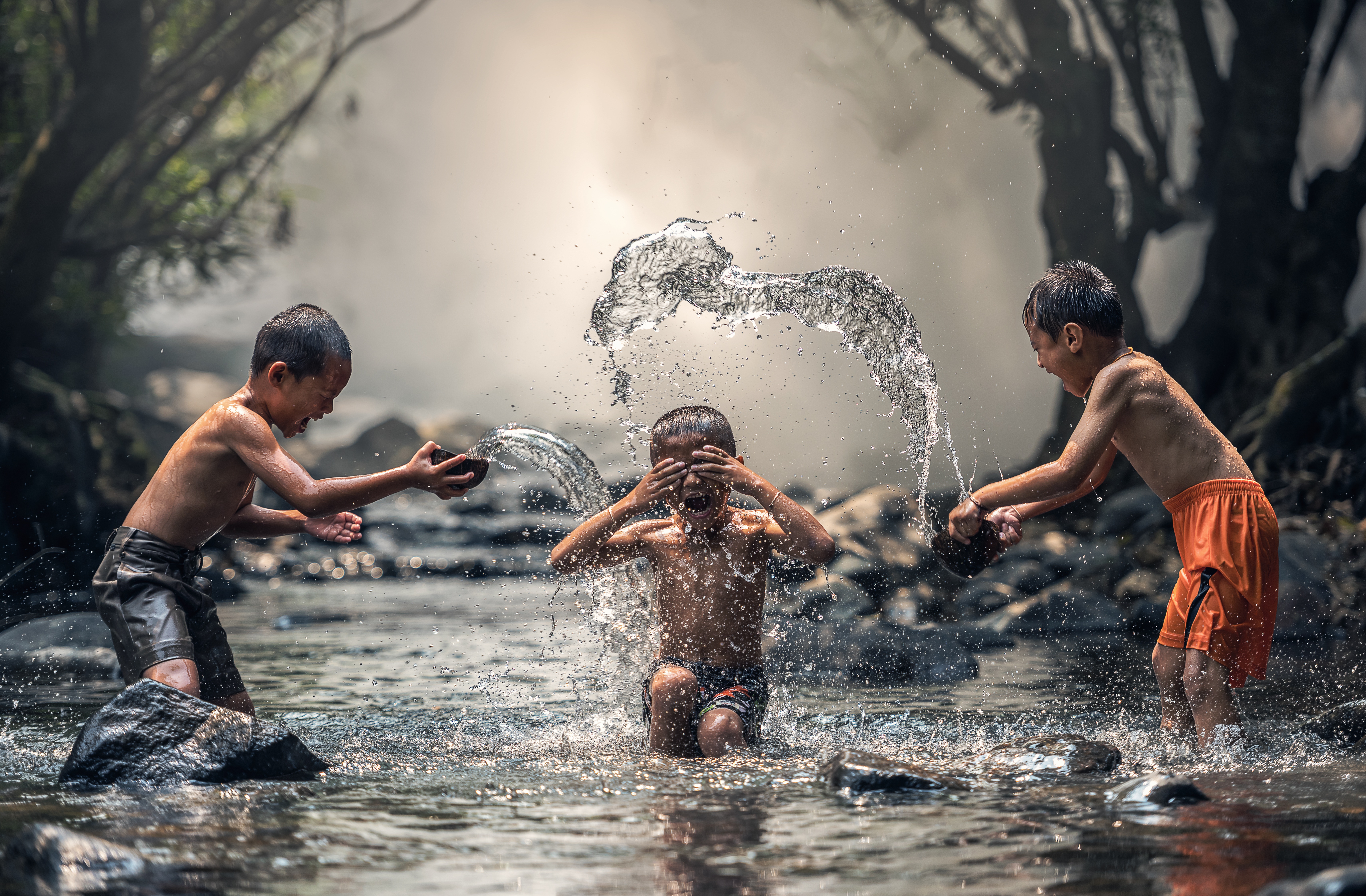 Image: Children playing in a pond